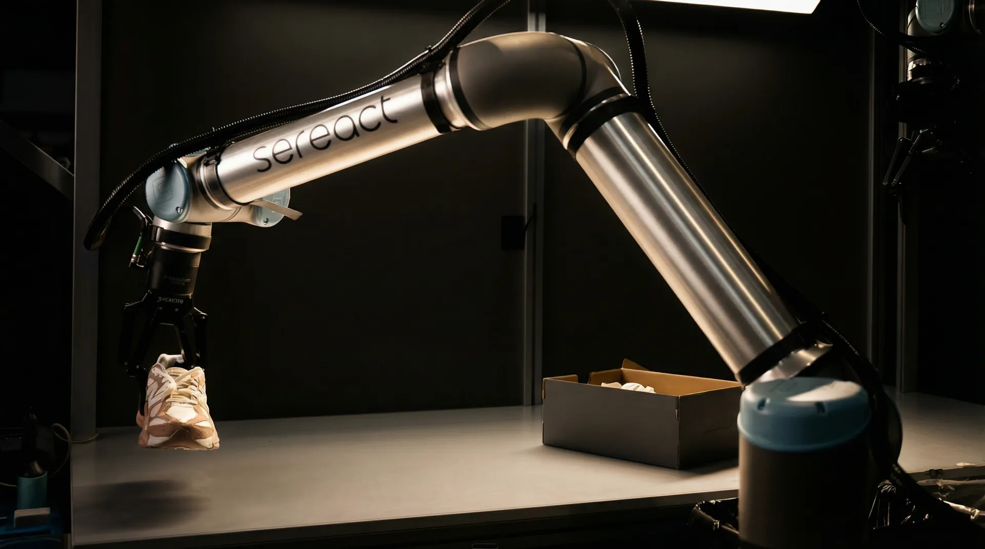 Sereact robotic arm handling a returned item